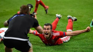 LILLE, FRANCE - JULY 01: Wales player Gareth Bale celebrates after the UEFA Euro 2016 Quarter Final match between Wales and Belguim at Stade Pierre-Mauroy on July 1, 2016 in Lille, France. (Photo by Stu Forster/Getty Images)