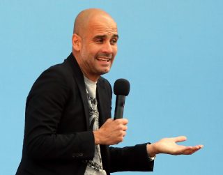 MANCHESTER, ENGLAND - JULY 03: Manchester City's new Manager Pep Guardiola (L) is unveiled during a media day at the Etihad campus on July 3, 2016 in Manchester, England. (Photo by Nigel Roddis/Getty Images)