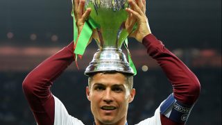 PARIS, FRANCE - JULY 10: Cristiano Ronaldo of Portugal holds the Henri Delaunay trophy to celebrate after his team's 1-0 win against France in the UEFA EURO 2016 Final match between Portugal and France at Stade de France on July 10, 2016 in Paris, France. (Photo by Matthias Hangst/Getty Images)