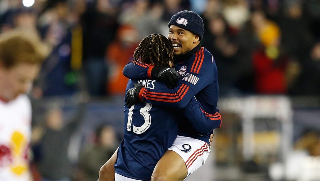 FOXBORO, MA - NOVEMBER 29: Jermaine Jones #13 of New England Revolution celebrates with Charlie Davies after they won the MLS Eastern Conference Championship as the the New York Red Bulls leave the field at Gillette Stadium on November 29, 2014 in Foxboro, Massachusetts. (Photo by Jim Rogash/Getty Images)