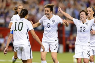 MONTREAL, QC - JUNE 30: Kelley O'Hara #5 of the United States celebrates with teammates after scoring a goal in the second half against Germany in the FIFA Women's World Cup 2015 Semi-Final Match at Olympic Stadium on June 30, 2015 in Montreal, Canada. (Photo by Minas Panagiotakis/Getty Images)