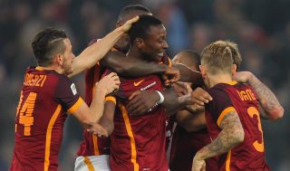 ROME, ITALY - DECEMBER 20: Umar Sadiq (C) with his teammates of AS Roma celebrates after scoring the team's second goal during the Serie A match between AS Roma and Genoa CFC at Stadio Olimpico on December 20, 2015 in Rome, Italy. (Photo by Paolo Bruno/Getty Images)