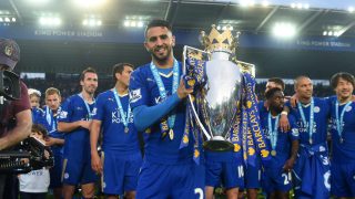 LEICESTER, ENGLAND - MAY 07: Riyad Mahrez of Leicester City poses with the Premier League Trophy as players and staffs celebrate the season champion after the Barclays Premier League match between Leicester City and Everton at The King Power Stadium on May 7, 2016 in Leicester, United Kingdom. (Photo by Michael Regan/Getty Images)