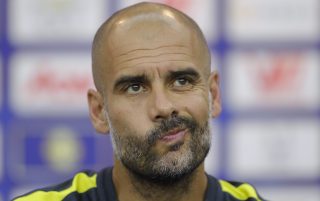 SHENZHEN, CHINA - JULY 27: Manchester City's manager Pep Guardiola attends a press conference for 2016 International Champions Cup match between Manchester City and Borussia Dortmund at Shenzhen Stadium on July 27, 2016 in Shenzhen, China. (Photo by Lintao Zhang/Getty Images)