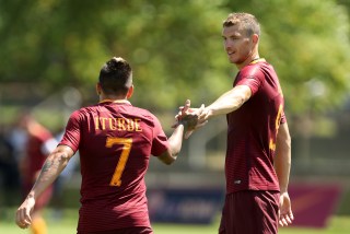 CAMBRIDGE, MA - JULY 27: Juan Manuel Iturbe #7 of AS Roma celebrates a goal with Edin Dzeko #9 during a friendly match against the Boston Bolts at Ohiri Field on July 27, 2016 in Cambridge, Massachusetts. (Photo by Mike Lawrie/Getty Images)