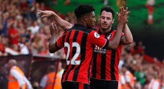 BOURNEMOUTH, ENGLAND - JULY 30: Jordan Ibe of Bournemouth is congratulated by team mate Adam Smith after scoring during a pre-season match between Bournemouth and Cardiff City at Goldsands Stadium on July 30, 2016 in Bournemouth, England. (Photo by Joel Ford/Getty Images)