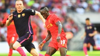 LONDON, ENGLAND - AUGUST 06: Sadio Mane of Liverpool is closed down by Jeremy Mathieu of Barcelona during the International Champions Cup match between Liverpool and Barcelona at Wembley Stadium on August 6, 2016 in London, England. (Photo by Michael Regan/Getty Images)