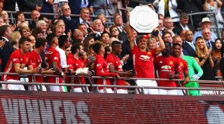LONDON, ENGLAND - AUGUST 07: Zlatan Ibrahimovic of Manchester United celebrates with his team mates after he lifts the Community Shield during The FA Community Shield match between Leicester City and Manchester United at Wembley Stadium on August 7, 2016 in London, England. (Photo by Michael Steele/Getty Images)