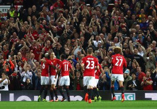 MANCHESTER, ENGLAND - AUGUST 19: Zlatan Ibrahimovic of Manchester United celebrates scoring his team's second goal from the penalty spot during the Premier League match between Manchester United and Southampton at Old Trafford on August 19, 2016 in Manchester, England. (Photo by Michael Steele/Getty Images)