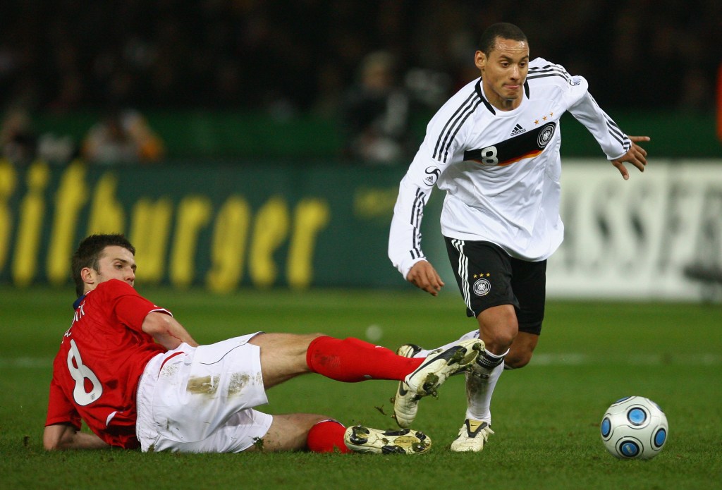 BERLIN - NOVEMBER 19: Jermaine Jones of Germany moves away from the challenge of Michael Carrick of England during the International Friendly match between Germany and England at the Olympic Stadium on November 19, 2008 in Berlin, Germany. (Photo by Alex Livesey/Getty Images)