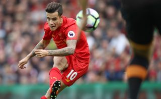 LIVERPOOL, ENGLAND - SEPTEMBER 24: Philippe Coutinho of Liverpool scores their fourth goal during the Premier League match between Liverpool and Hull City at Anfield on September 24, 2016 in Liverpool, England. (Photo by Julian Finney/Getty Images)