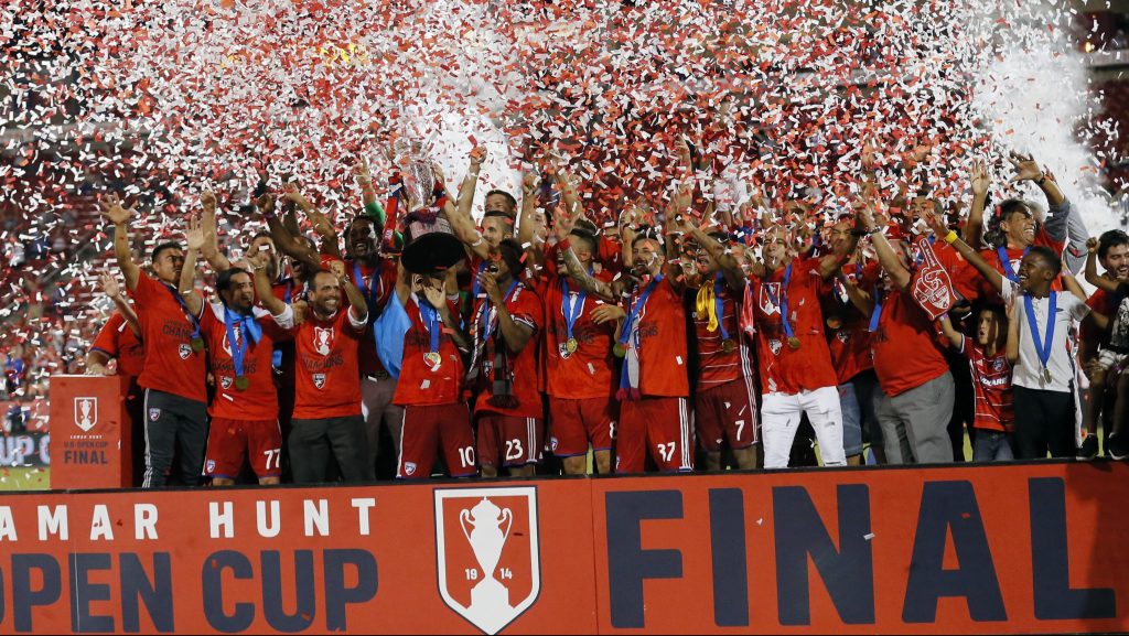 FC Dallas celebrates its 4-2 win over the New England Revolution in the U.S. Open Cup soccer final, Tuesday Sept. 13, 2016, in Frisco, Texas. (AP Photo/Tony Gutierrez)