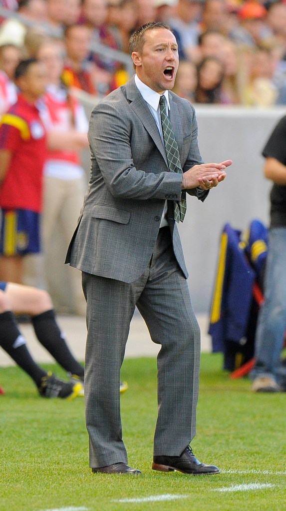 SANDY, UT - APRIL 19: Head coach Caleb Porter of the Portland Timbers encourages his team during their game against Real Salt Lake at Rio Tinto Stadium April 19, 2014 in Sandy, Utah. (Photo by Gene Sweeney Jr/Getty Images)