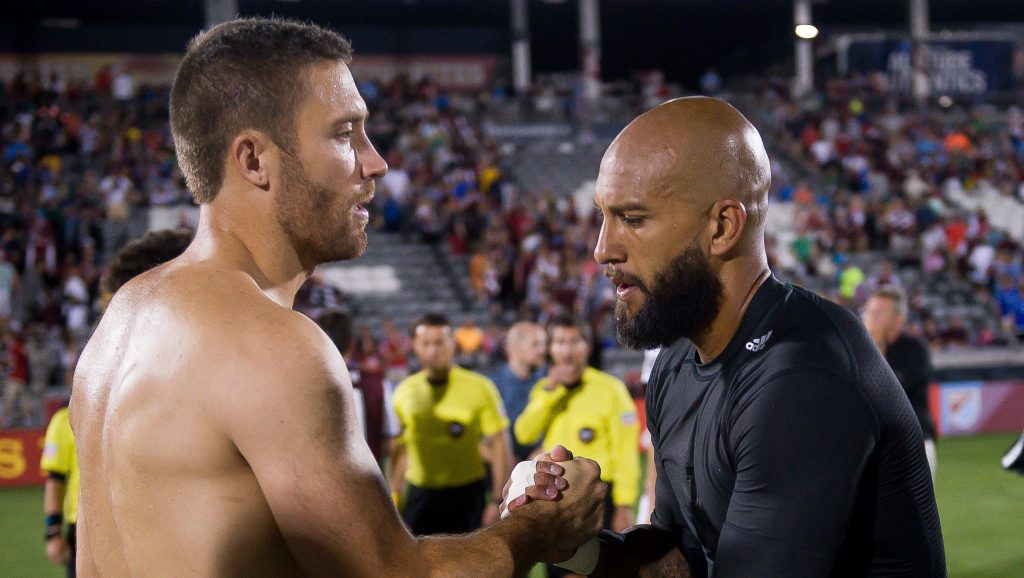 COMMERCE CITY, CO - JULY 23: Tim Howard #1 of the Colorado Rapids and Chris Seitz #18 of FC Dallas exchange jerseys after a game at Dick's Sporting Goods Park on July 23, 2016 in Commerce City, Colorado. (Photo by Dustin Bradford/Getty Images)