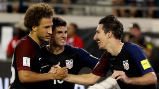 JACKSONVILLE, FL - SEPTEMBER 06: Sacha Kljestan #16 of the United States (R) is congratulated by Christian Pulisic #10 and Fabian Johnson #23 following a goal during the FIFA 2018 World Cup Qualifier against Trinidad &Tobago at EverBank Field on September 6, 2016 in Jacksonville, Florida. (Photo by Sam Greenwood/Getty Images)