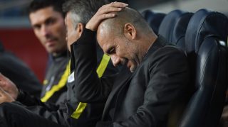 BARCELONA, SPAIN - OCTOBER 19: Josep Guardiola, Manager of Manchester City scratches his head prior to the UEFA Champions League group C match between FC Barcelona and Manchester City FC at Camp Nou on October 19, 2016 in Barcelona, Spain. (Photo by Shaun Botterill/Getty Images)