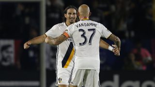 Los Angeles Galaxy defender Jelle Van Damme (37) congratulates forward Alan Gordon (9) for scoring against the Real Salt Lake during the first half of a knockout round MLS playoff soccer match in Carson, Calif., Wednesday, Oct. 26, 2016. (AP Photo/Alex Gallardo)