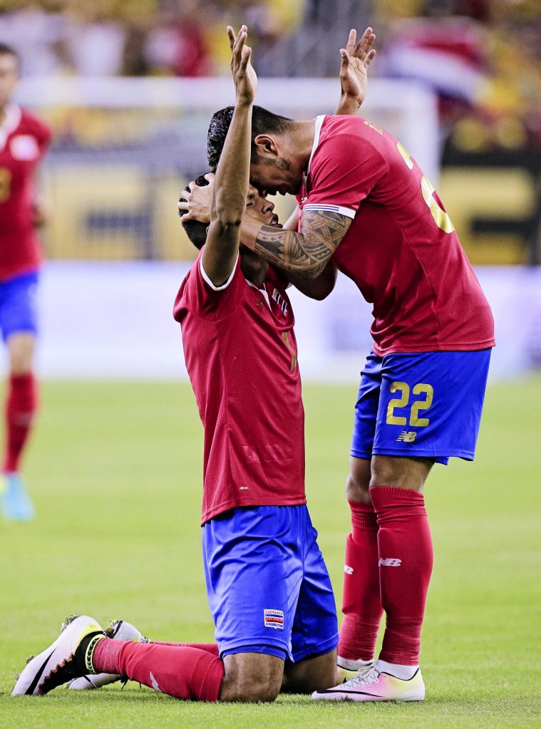 HOUSTON, TX - JUNE 11: Johan Venegas #11 of Costa Rica celebrates with Ronald Matarrita #22 after scoring in game action agaisnt Colombia at NRG Stadium on June 11, 2016 in Houston, Texas. (Photo by Bob Levey/Getty Images)