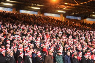LONDON, ENGLAND - DECEMBER 26: Fans wear 'Father Christmas' style hats during the Barclays Premier League match between Crystal Palace and Southampton at Selhurst Park on December 26, 2014 in London, England. (Photo by Christopher Lee/Getty Images)