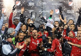 TORONTO, ON - NOVEMBER 30: Michael Bradley #4 of Toronto FC and teammates celebrate with the Eastern Conference Trophy following the MLS Eastern Conference Final, Leg 2 game against Montreal Impact at BMO Field on November 30, 2016 in Toronto, Ontario, Canada. (Photo by Vaughn Ridley/Getty Images)