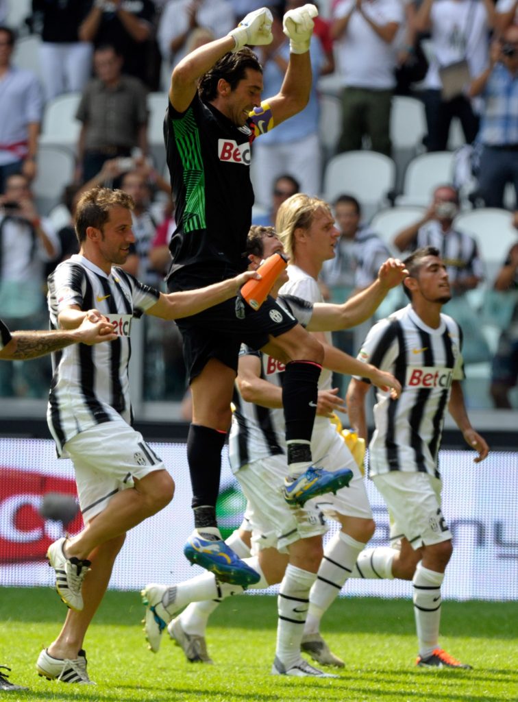 TURIN, ITALY - SEPTEMBER 11: (L-R) Mirko Vucinic, Alessandro Del Piero and Gianluigi Buffon of Juventus FC celebrate their victory after the Serie A match between Juventus FC v Parma FC at Juventus Stadium on September 11, 2011 in Turin, Italy. (Photo by Claudio Villa/Getty Images)