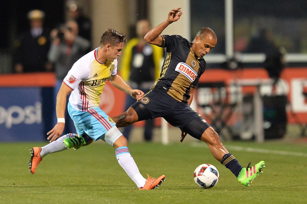 COLUMBUS, OH - MARCH 12: Ethan Finlay #13 of the Columbus Crew SC and Fabinho #33 of the Philadelphia Union battle for control of the ball in the first half on March 12, 2016 at MAPFRE Stadium in Columbus, Ohio. (Photo by Jamie Sabau/Getty Images)