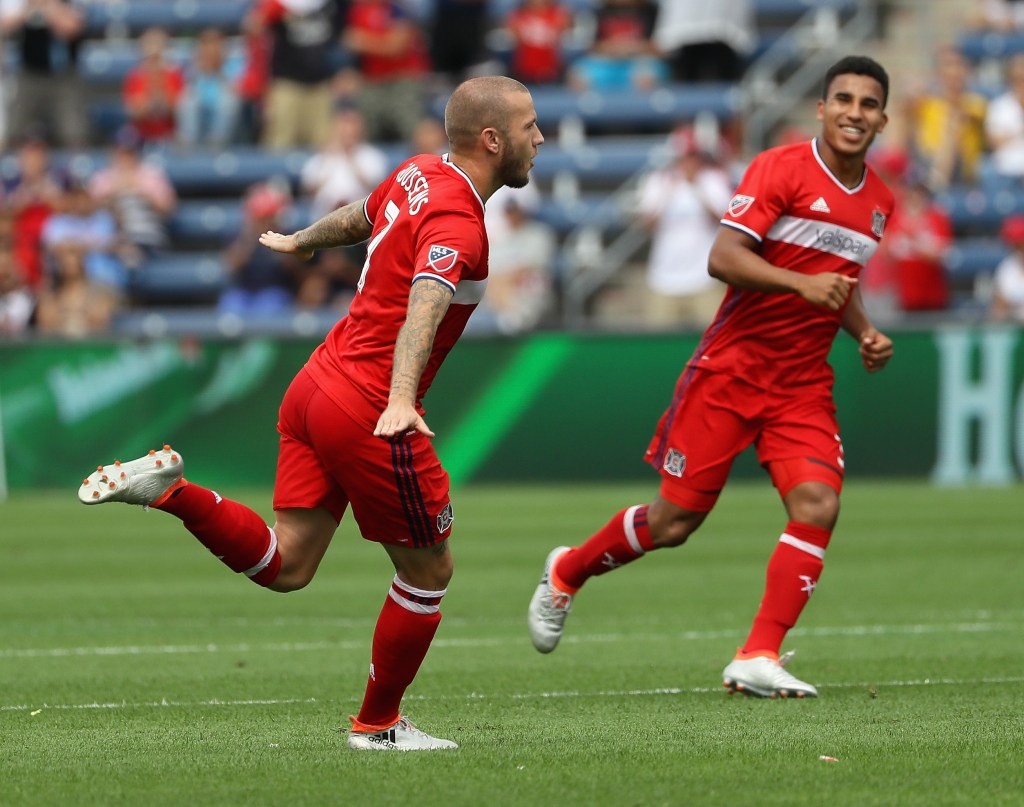 BRIDGEVIEW, IL - AUGUST 14: John Goossens #7 of Chicago Fire celebrates a goal against Orlando City FC with teammate Brandon Vincent #3 during an MLS match at Toyota Park on August 14, 2016 in Bridgeview, Illinois. The Fire and Orlando City SC tied 2-2. (Photo by Jonathan Daniel/Getty Images)