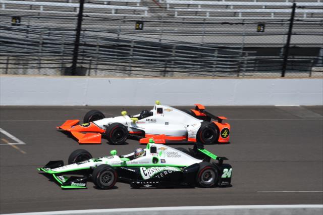 Lazier (4) and Karam (24). Photo: IndyCar