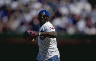 Chicago Bears great Walter Payton in one of his final public appearances, throwing out the first pitch at Wrigley Field before a Chicago Cubs game. He would be dead just over six months later after a couragious battle with liver disease and bile duct cancer.