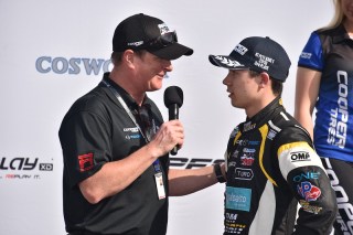 "Can you believe it?" -Rob Howden, most likely, to Megennis (right). Photo: Indianapolis Motor Speedway LLC Photography