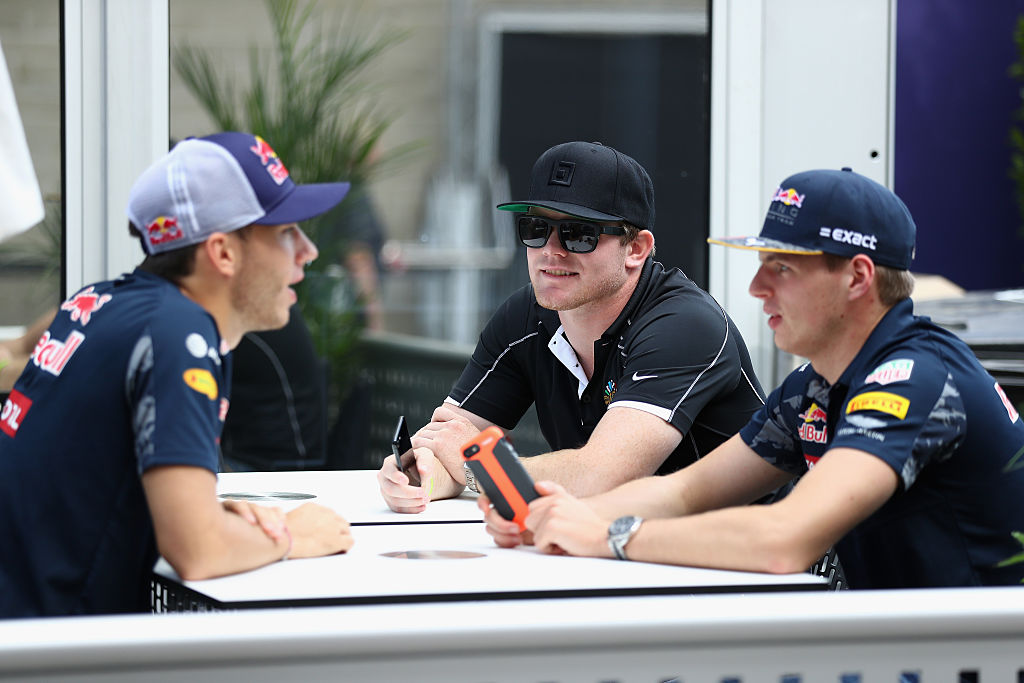 AUSTIN, TX - OCTOBER 20: Max Verstappen of Netherlands and Red Bull Racing talks with IndyCar driver Conor Daly of United States and Pierre Gasly of France and Red Bull Racing in the Paddock during previews ahead of the United States Formula One Grand Prix at Circuit of The Americas on October 20, 2016 in Austin, United States. (Photo by Clive Mason/Getty Images)