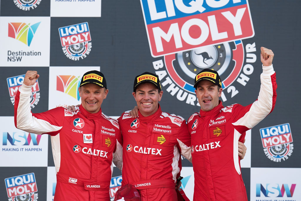 BATHURST, NEW SOUTH WALES - FEBRUARY 05: Toni Vilander, Craig Lowndes and Jamie Whincup drivers of the #88 Maranello Motorsport Ferrari celebrate on the podium after winning the 2017 Bathurst 12 hour race at Mount Panorama on February 5, 2017 in Bathurst, Australia. (Photo by Daniel Kalisz/Getty Images)