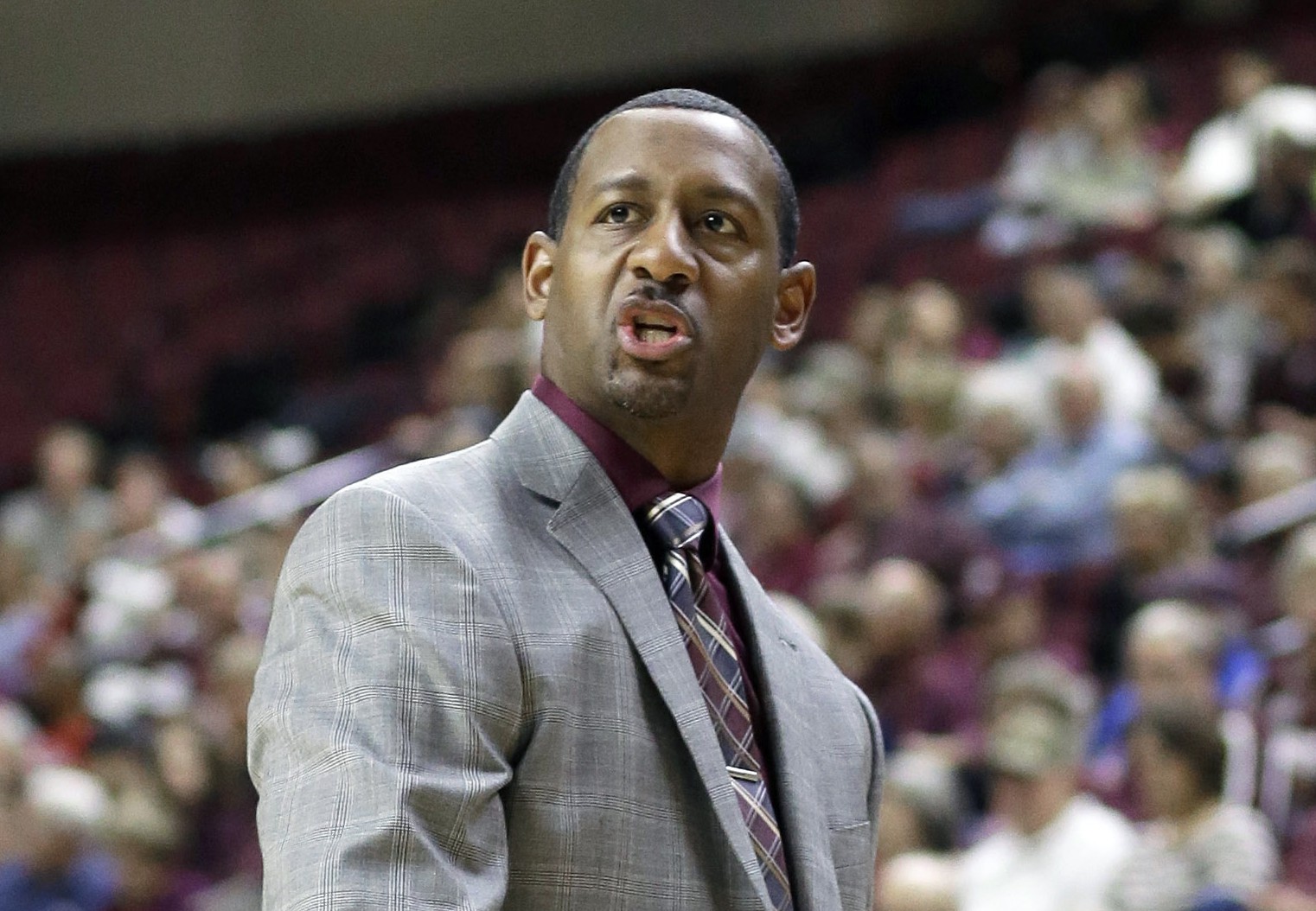 Montana head coach Travis DeCuire disagrees with a call in the first half of an NIT first-round college basketball game against Texas A&M Tuesday, March 17, 2015, in College Station, Texas. (AP Photo/Pat Sullivan)