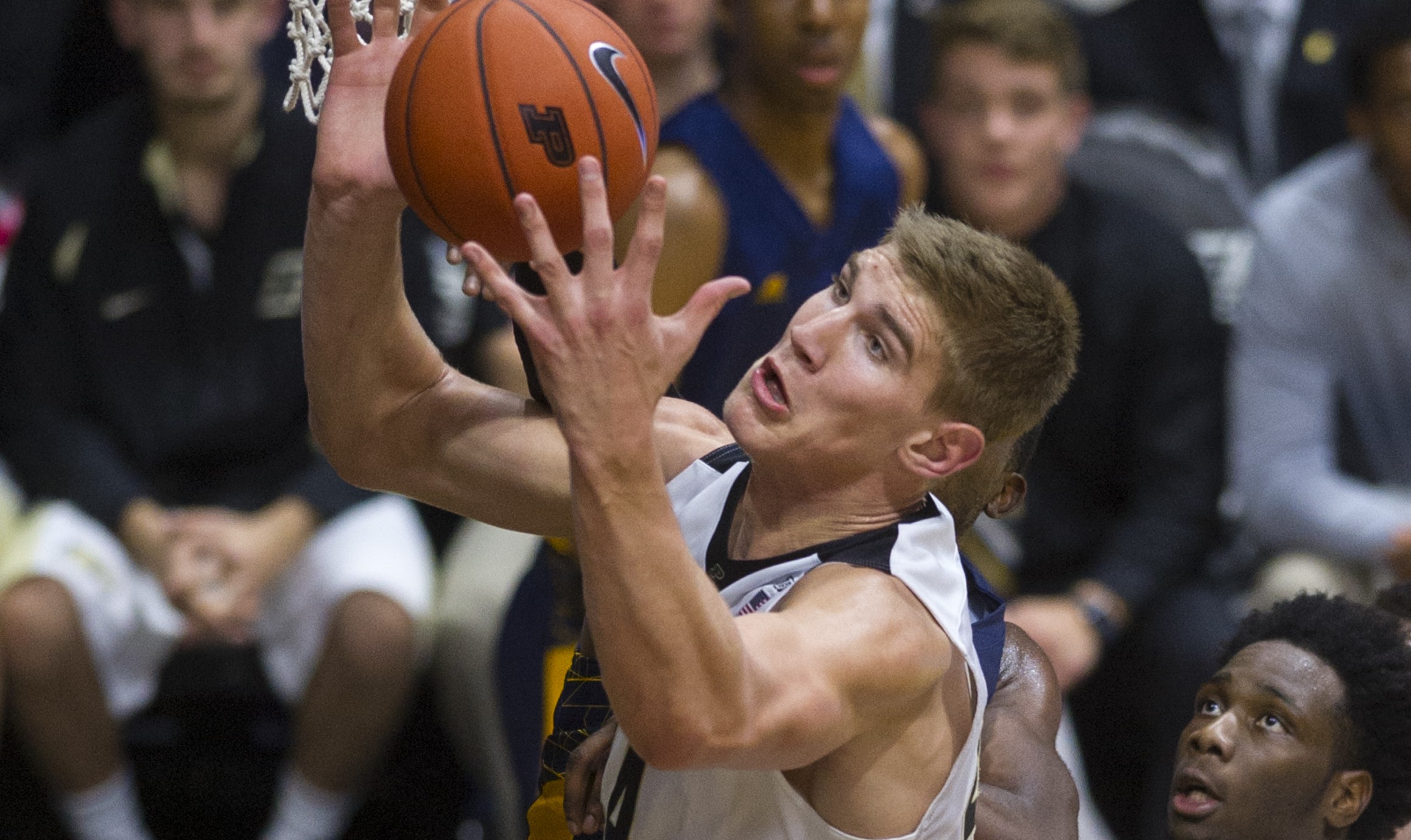 Purdue center Isaac Haas (44) goes after a rebound against North Carolina A&T during the second half of an NCAA college basketball game Friday, Nov. 13, 2015, in West Lafayette, Ind. Purdue won 81-40. (AP Photo/Doug McSchooler)