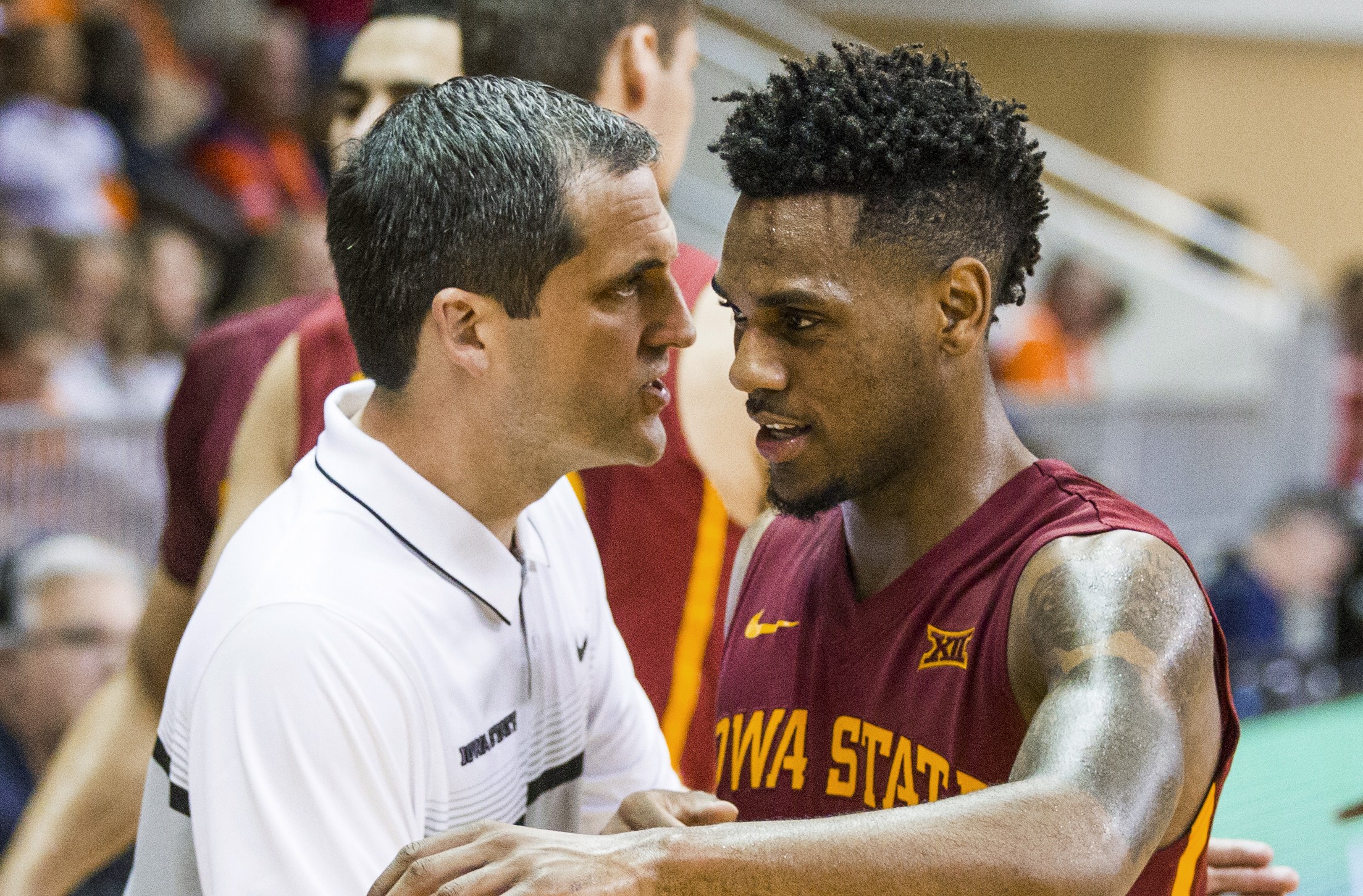 Steve Prohm and Monte Morris (AP Photo/Mark Wallheiser)