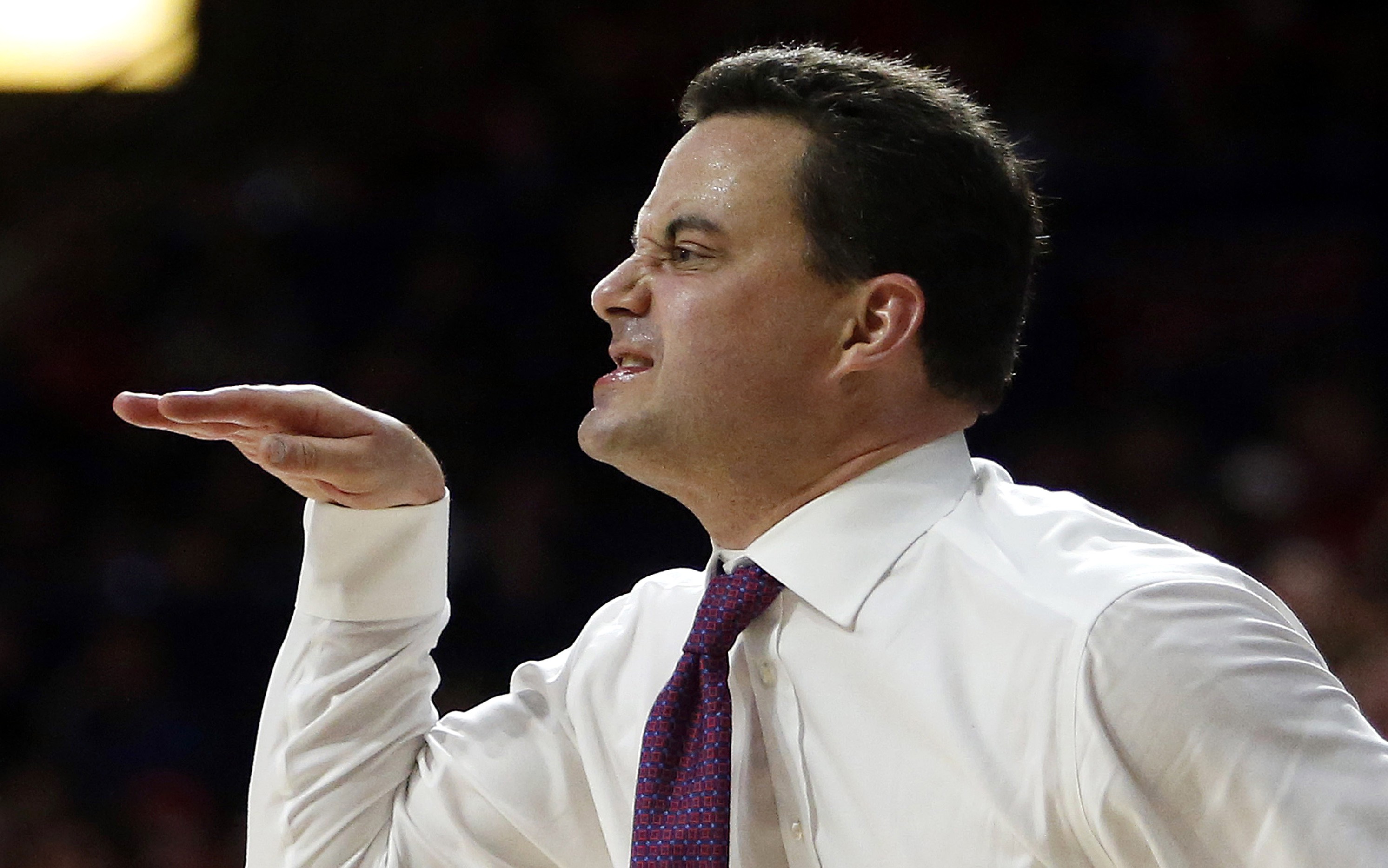 Arizona coach Sean Miller reacts to a foul call during the first half of Arizona's NCAA college basketball game against UCLA, Friday, Feb 12, 2016, in Tucson, Ariz. (AP Photo/Rick Scuteri)