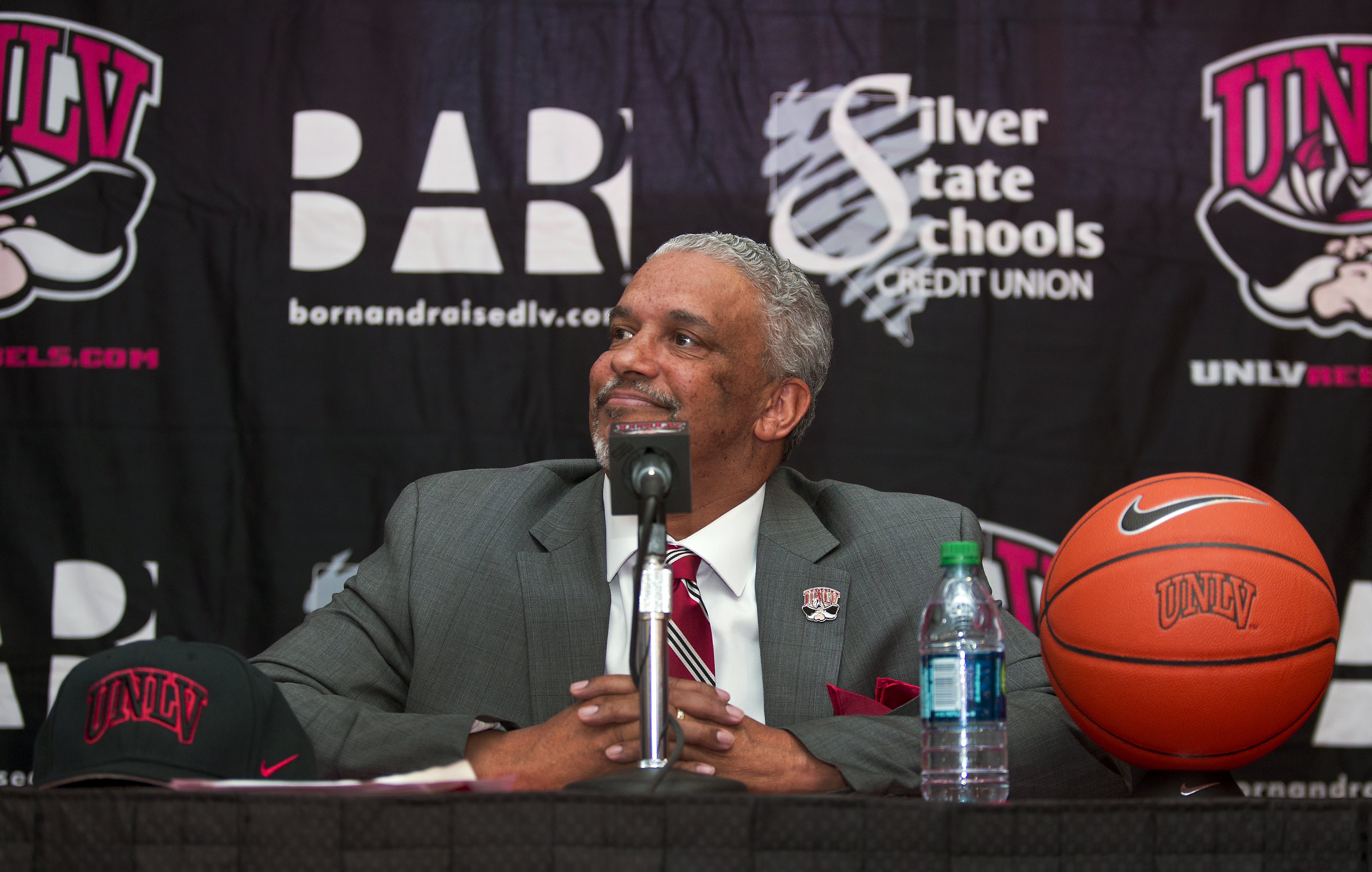 New UNLV men's basketball coach Marvin Menzies smiles during a news conference after the UNLV board of regents approved his contract, Friday, April 22, 2016 in Las Vegas. The boards voted 12-1 on Friday to approve a five-year, $3.75 million deal for Menzies. (L.E. Baskow/Las Vegas Sun via AP) LAS VEGAS REVIEW-JOURNAL OUT; MANDATORY CREDIT