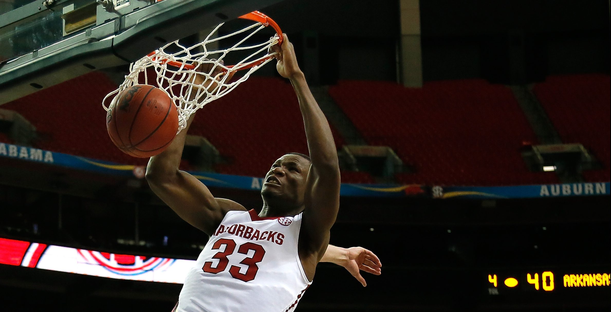ATLANTA, GA - MARCH 13: Moses Kingsley #33 of the Arkansas Razorbacks dunks against the South Carolina Gamecocks during the second round of the SEC Men's Basketball Tournament at Georgia Dome on March 13, 2014 in Atlanta, Georgia. (Photo by Kevin C. Cox/Getty Images)