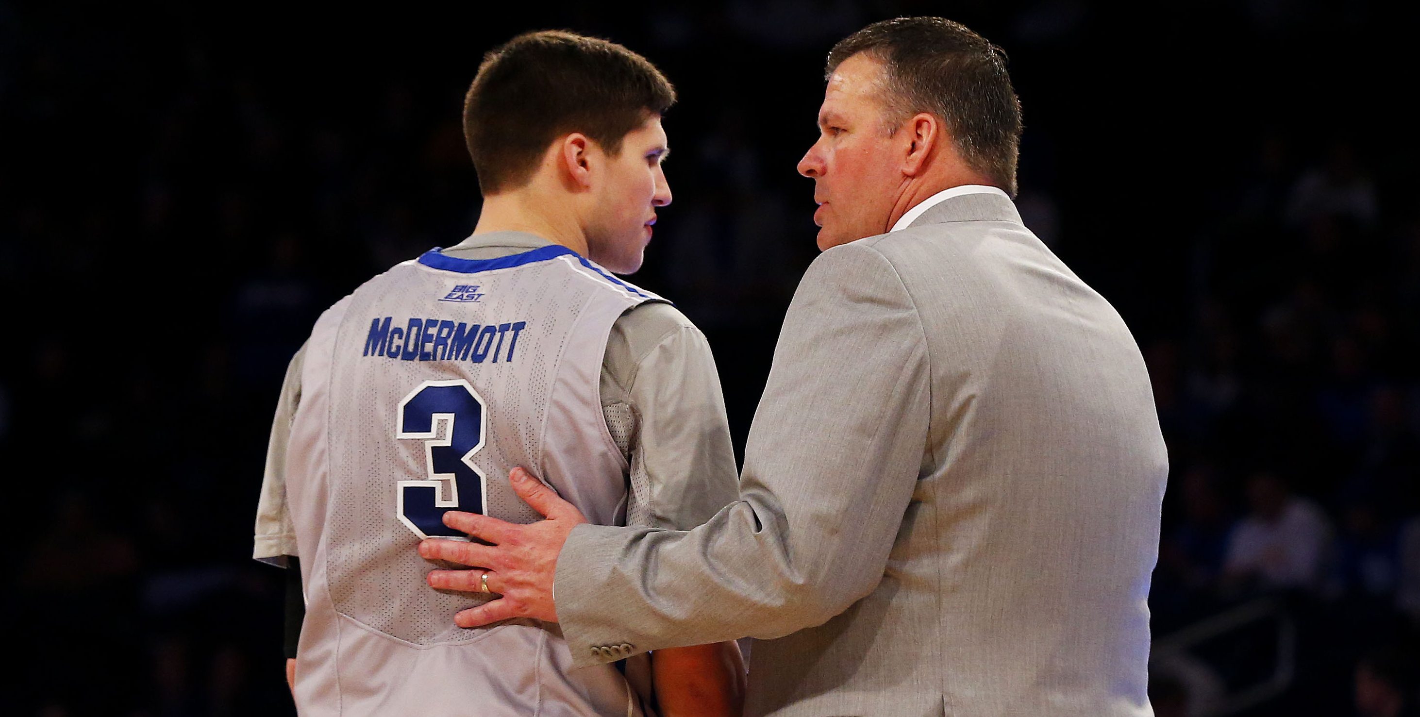 NEW YORK, NY - MARCH 14: Head coach Greg McDermott talks to his son Doug McDermott #3 of the Creighton Bluejays in the second half against the Xavier Musketeers during the Semifinals of the 2014 Men's Big East Basketball Tournament at Madison Square Garden on March 14, 2014 in New York City. (Photo by Jim McIsaac/Getty Images)