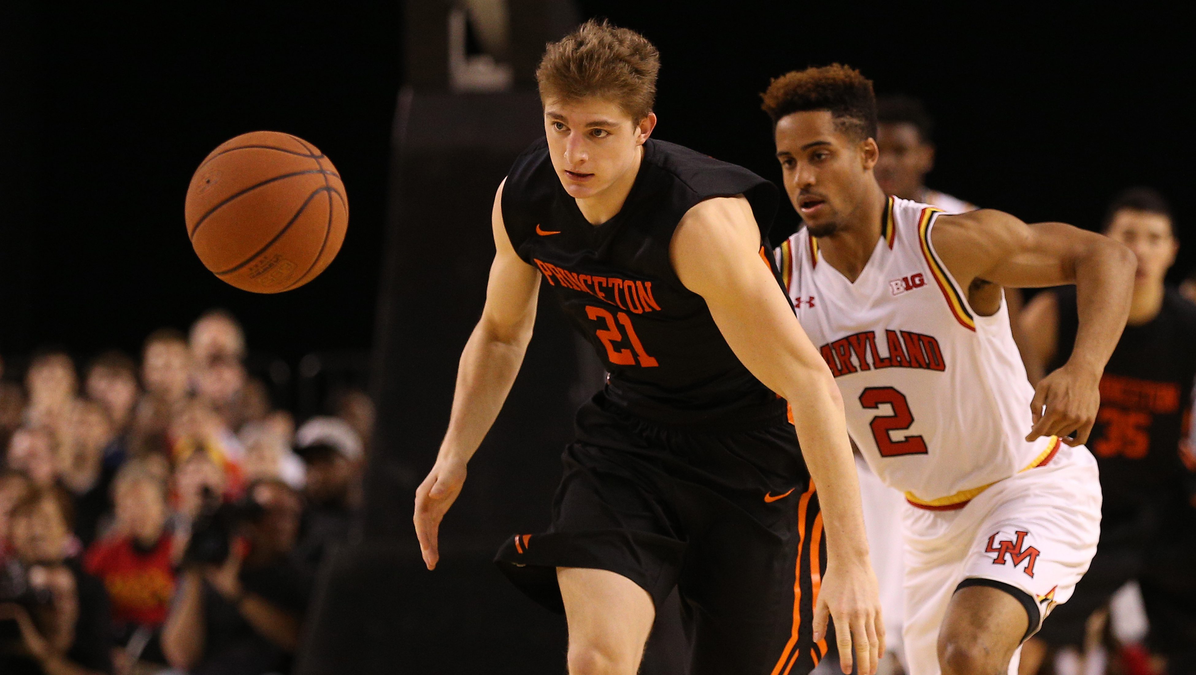 BALTIMORE, MD - DECEMBER 19: Henry Caruso #21 of the Princeton Tigers dribbles past Melo Trimble #2 of the Maryland Terrapins during the second half at Royal Farms Arena on December 19, 2015 in Baltimore, Maryland. The Maryland Terrapins won, 82-61.(Photo by Patrick Smith/Getty Images)