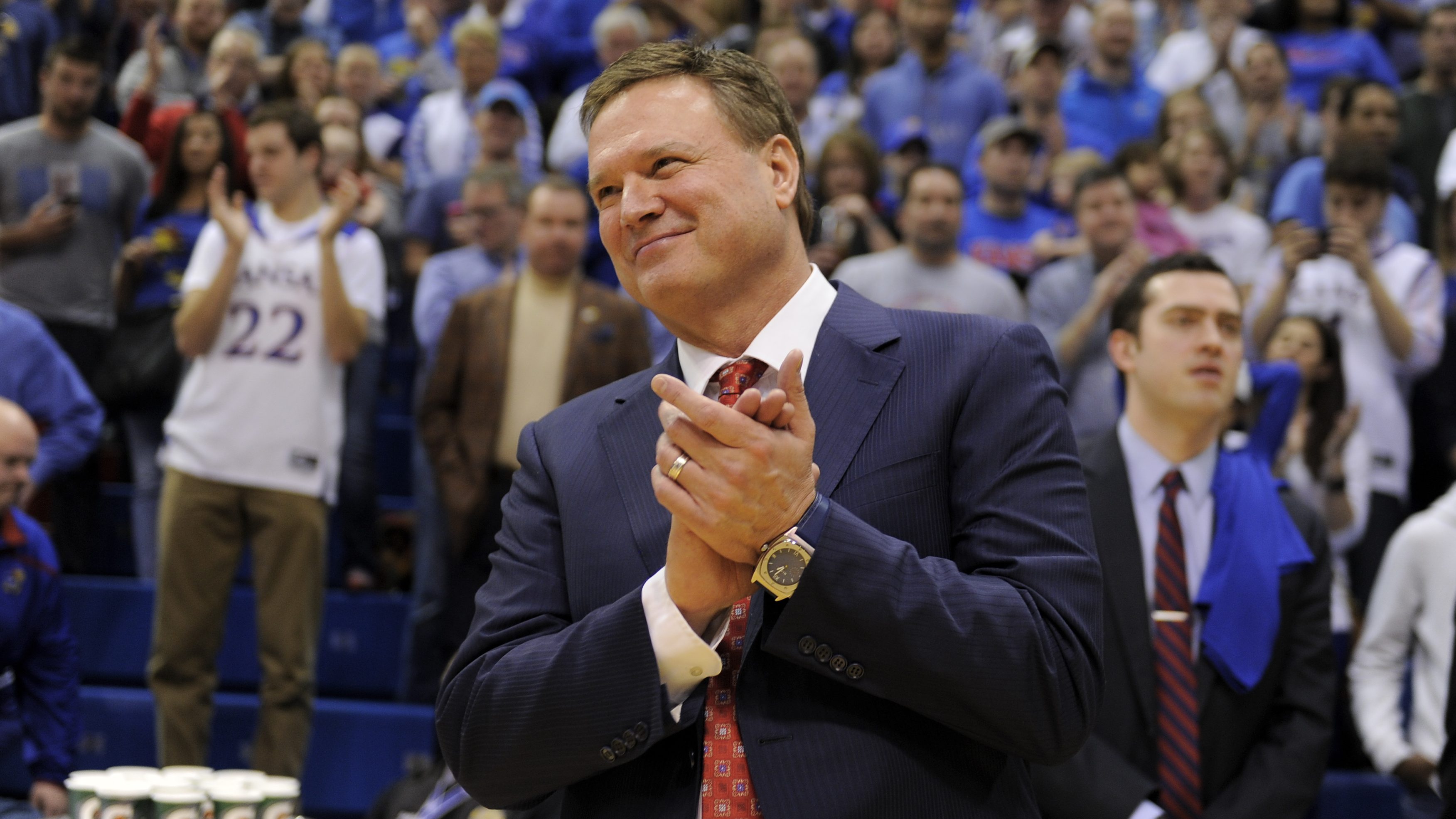 LAWRENCE, KS - FEBRUARY 27: Bill Self head coach of the Kansas Jayhawks claps for his team as they celebrate winning the Big 12 Conference Championship after they defeated Texas Tech Red Raiders 67-58 at Allen Fieldhouse on February 27, 2016 in Lawrence, Kansas. With the win, Kansas clinched its 12th straight conference championship. (Photo by Ed Zurga/Getty Images)