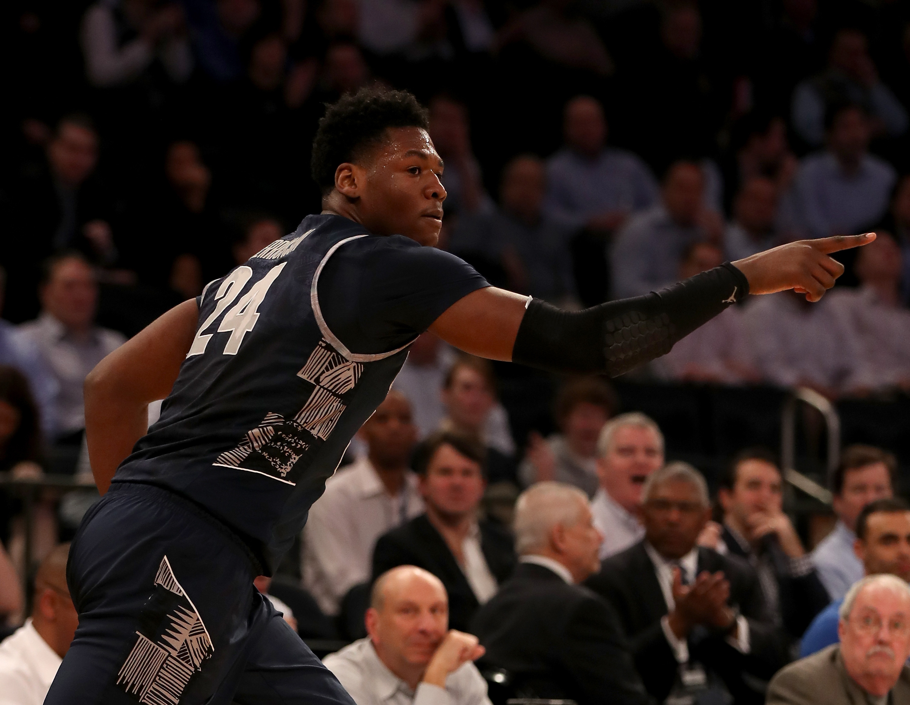 NEW YORK, NY - MARCH 10: Marcus Derrickson #24 of the Georgetown Hoyas celebrates his three point shot in the first half against the Villanova Wildcats during the quarterfinals of the Big East Basketball Tournament on March 10, 2016 at Madison Square Garden in New York City. (Photo by Elsa/Getty Images)