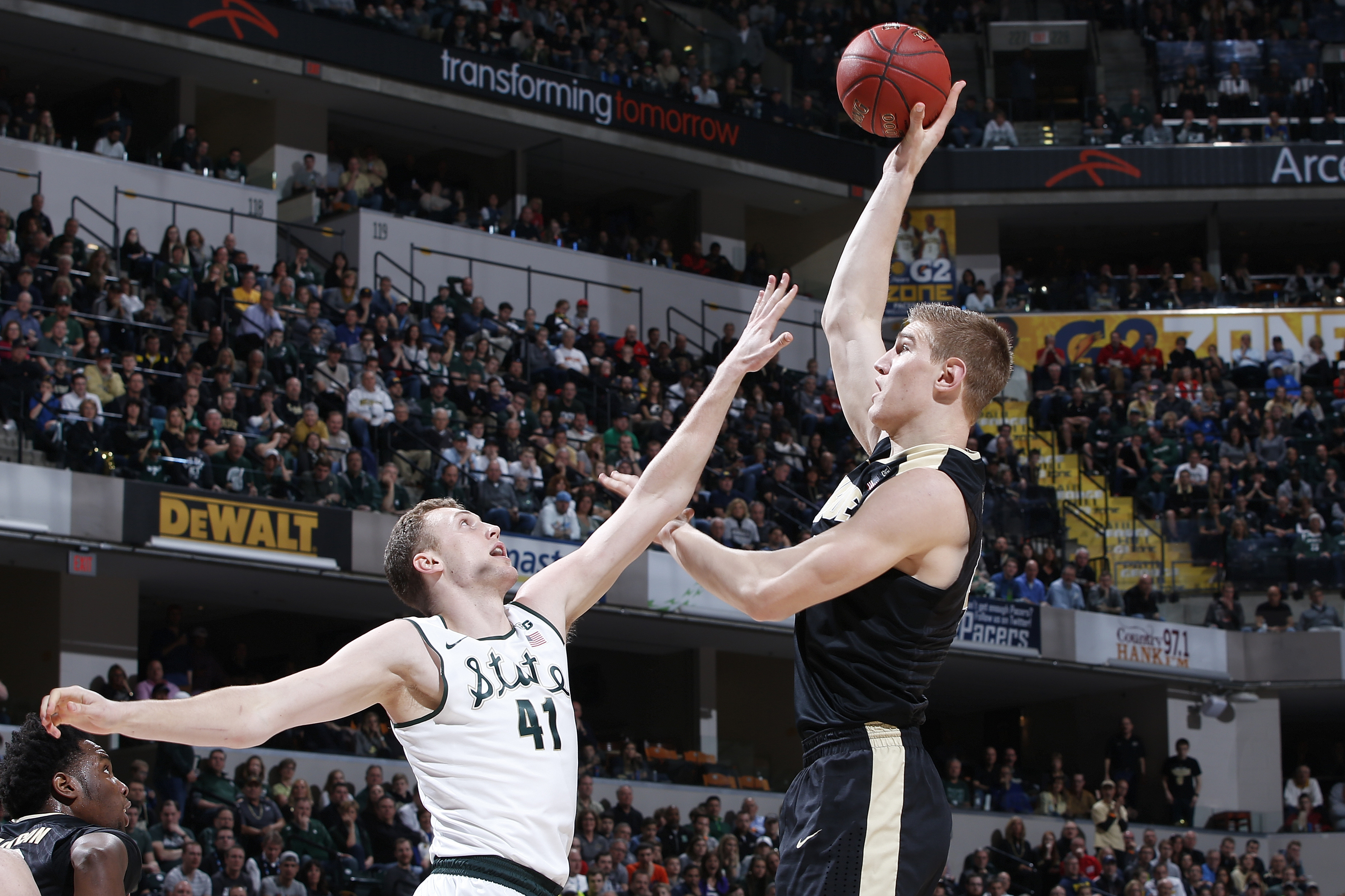 INDIANAPOLIS, IN - MARCH 13: Isaac Haas #44 of the Purdue Boilermakers shoots against Colby Wollenman #41 of the Michigan State Spartans in the championship game of the Big Ten Basketball Tournament at Bankers Life Fieldhouse on March 13, 2016 in Indianapolis, Indiana. (Photo by Joe Robbins/Getty Images)