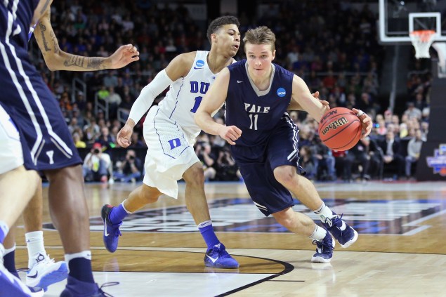 PROVIDENCE, RI - MARCH 19: Makai Mason #11 of the Yale Bulldogs dribbles the ball in the first half against the Duke Blue Devils during the second round of the 2016 NCAA Men's Basketball Tournament at Dunkin' Donuts Center on March 19, 2016 in Providence, Rhode Island. (Photo by Jim Rogash/Getty Images)