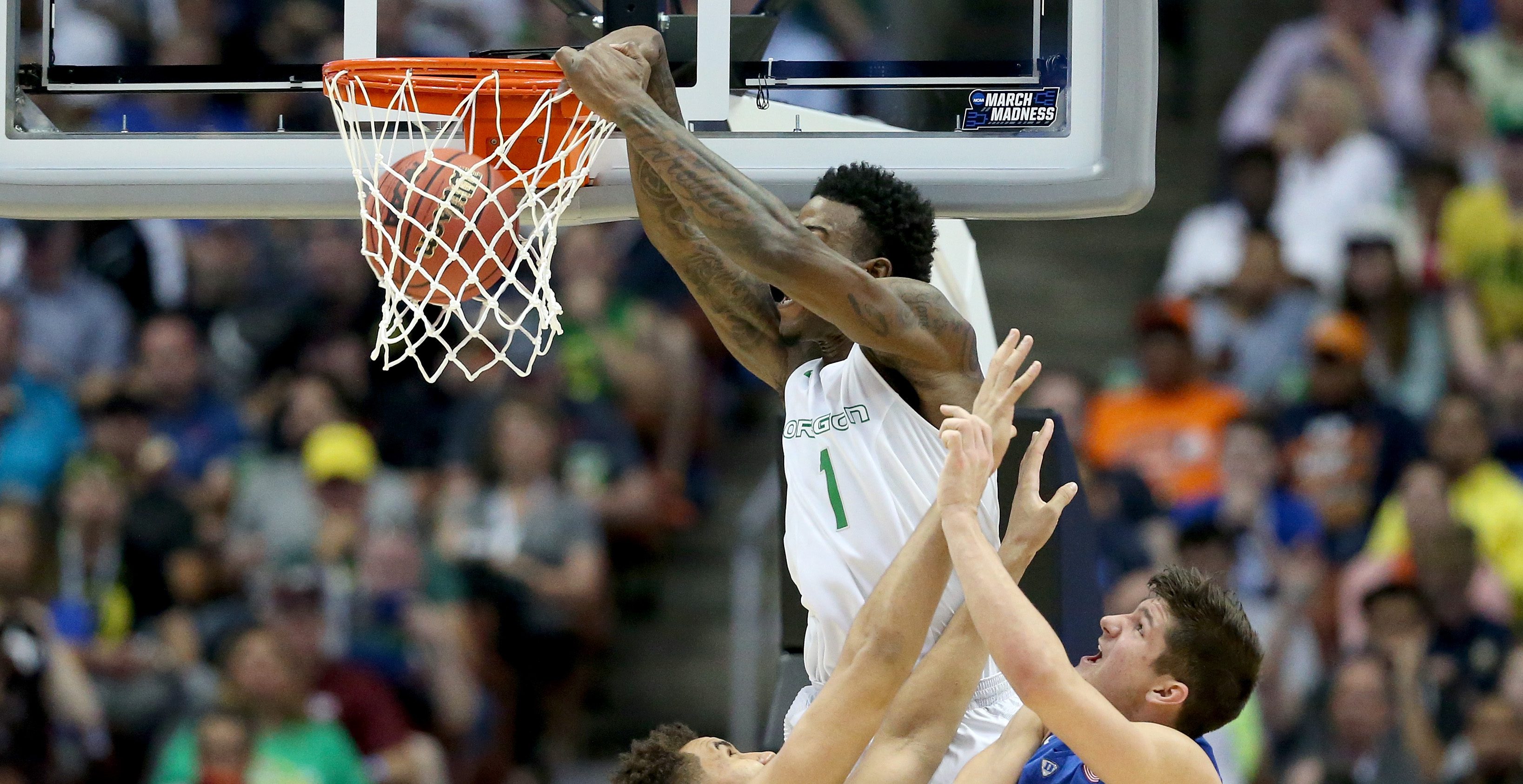 ANAHEIM, CA - MARCH 24: Jordan Bell #1 of the Oregon Ducks dunks the ball against Chase Jeter #2 and Grayson Allen #3 of the Duke Blue Devils in the first half in the 2016 NCAA Men's Basketball Tournament West Regional at the Honda Center on March 24, 2016 in Anaheim, California. (Photo by Sean M. Haffey/Getty Images)