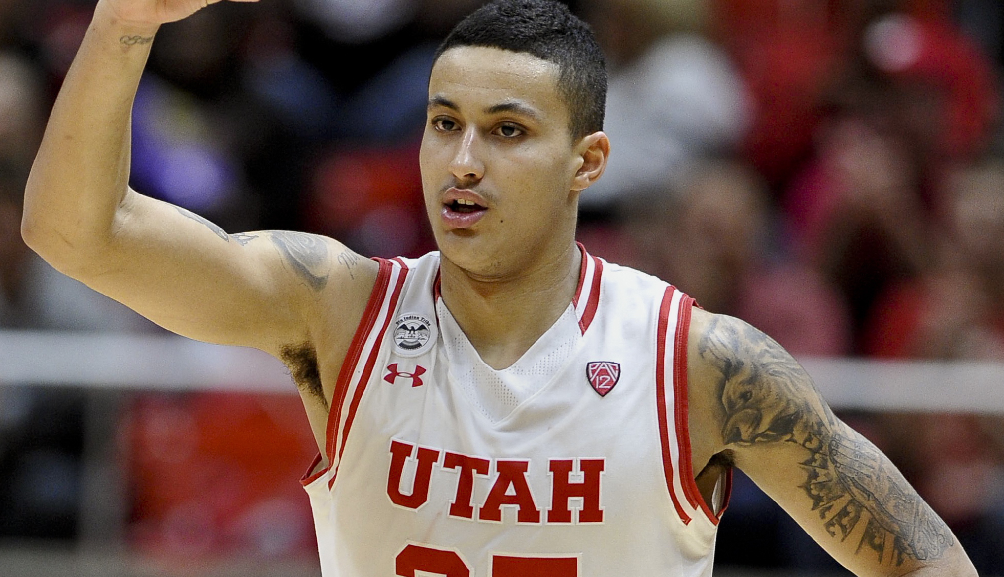 SALT LAKE CITY, UT - FEBRUARY 10: Kyle Kuzma #35 of the Utah Utes gestures after a three-point play in the second half of Utah's 90-82 win over the Washington Huskies at the Jon M. Huntsman Center on February 10, 2016 in Salt Lake City, Utah. (Photo by Gene Sweeney Jr/Getty Images)