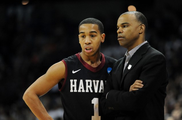 SPOKANE, WA - MARCH 22: Head coach Tommy Amaker talks to Siyani Chambers #1 of the Harvard Crimson in the first half against the Michigan State Spartans during the Third Round of the 2014 NCAA Basketball Tournament at Spokane Veterans Memorial Arena on March 22, 2014 in Spokane, Washington. (Photo by Steve Dykes/Getty Images)