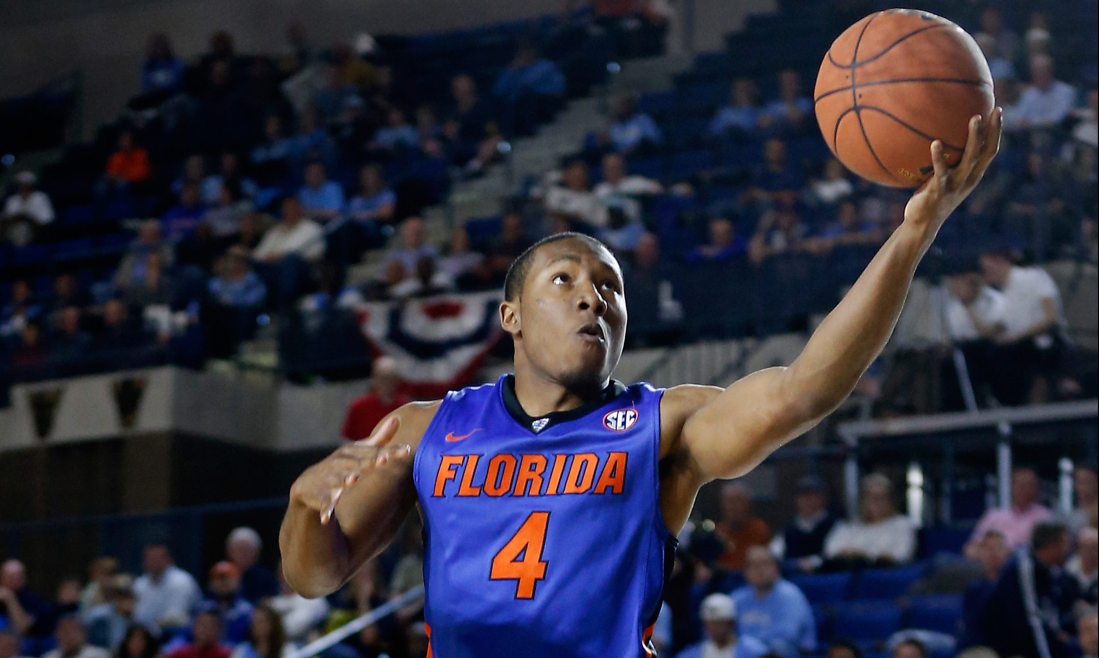 ANNAPOLIS, MD - NOVEMBER 13: KeVaughn Allen #4 of the Florida Gators puts up a shot in front of Jace Hogan #44 of the Navy Midshipmen in the first half during the Veterans Classic at Alumni Hall on November 13, 2015 in Annapolis, Maryland. (Photo by Rob Carr/Getty Images)