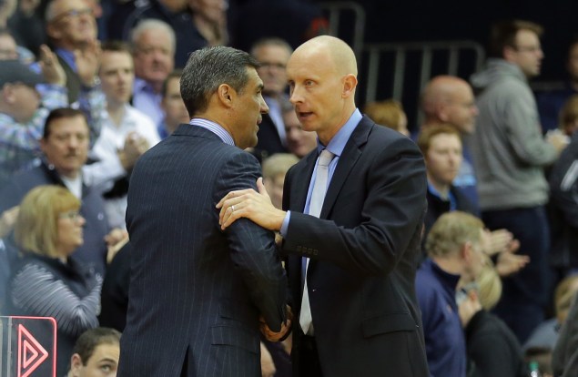 VILLANOVA, PA - DECEMBER 31: Head coach Jay Wright of the Villanova Wildcats shakes hands with head coach Chris Mack of the Xavier Musketeers after a game at the Pavilion on the campus of Villanova University on December 31, 2015 in Philadelphia, Pennsylvania.(Photo by Hunter Martin/Getty Images)
