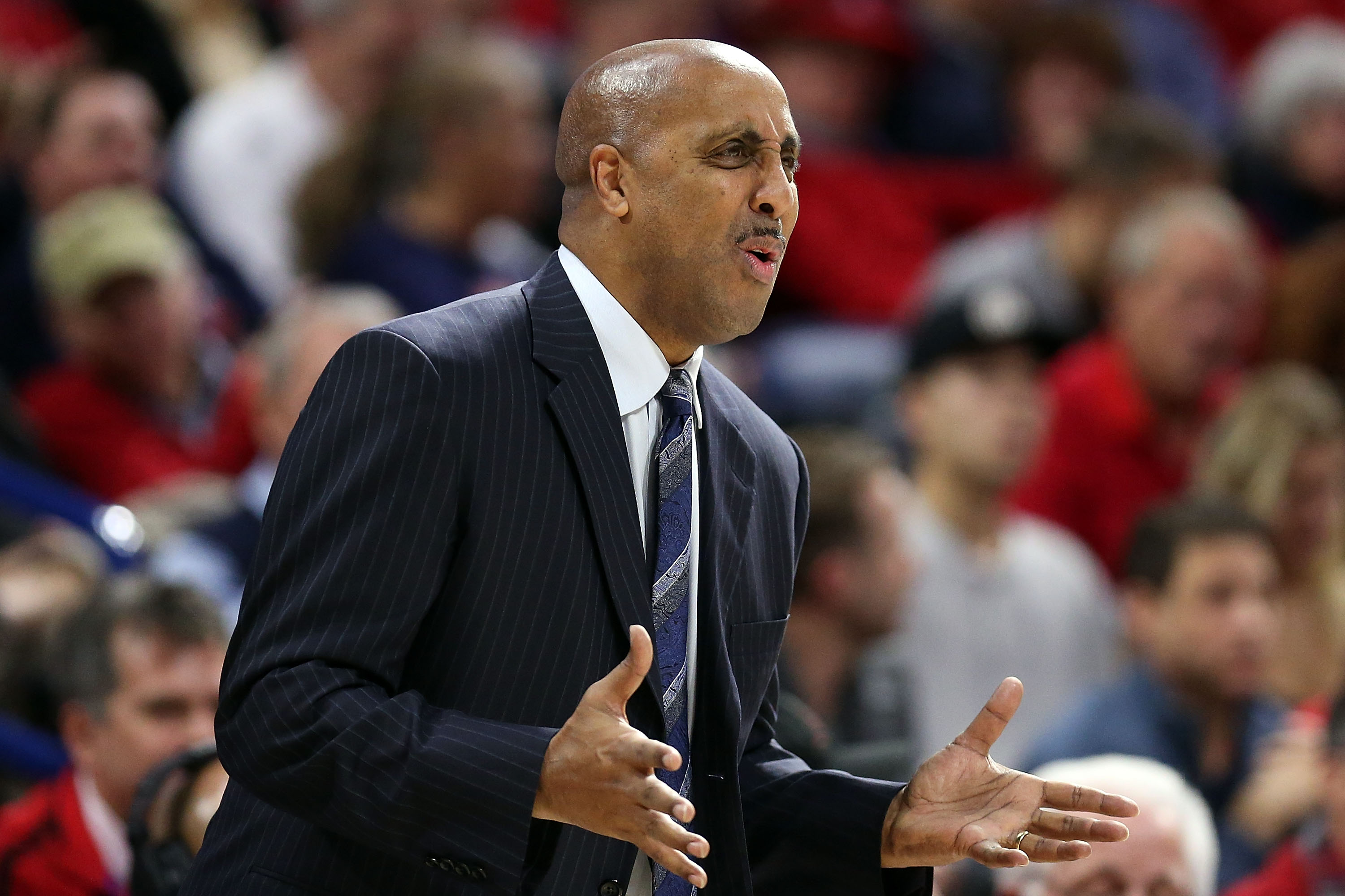 TUCSON, AZ - JANUARY 14: Head coach Lorenzo Romar of the Washington Huskies gestures during the first half of the college basketball game at McKale Center on January 14, 2016 in Tucson, Arizona. The Arizona Wildcats beat the Washington Huskies 99-67. (Photo by Chris Coduto/Getty Images)